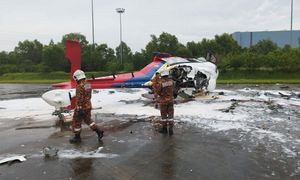 Seven, including pilot, safe after helicopter crashes in Subang