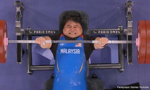 Bonnie lifts Malaysia to second gold, setting new world record