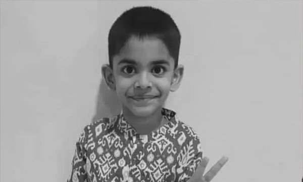 With 6-year-old son killed and husband detained, mother struggles to cope