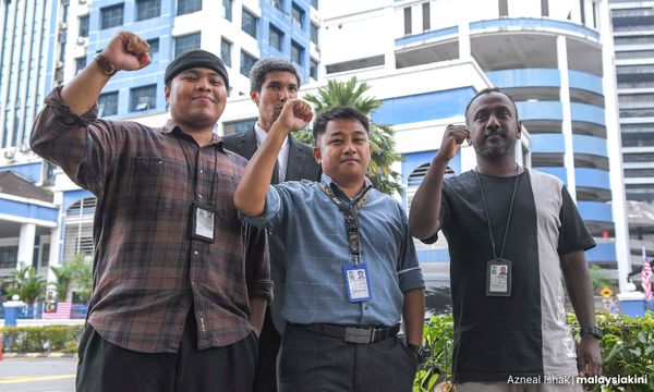 Mkini journalists refuse to reveal source during police questioning