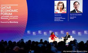 On Bloomberg platform, Anwar defends action against news outlet
