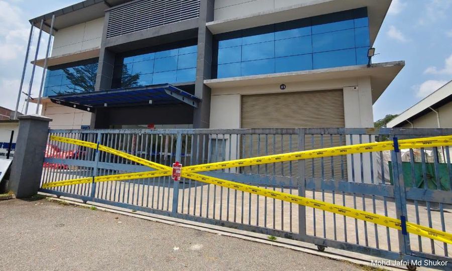 Johor factory temporarily shut over 'upside down' flags
