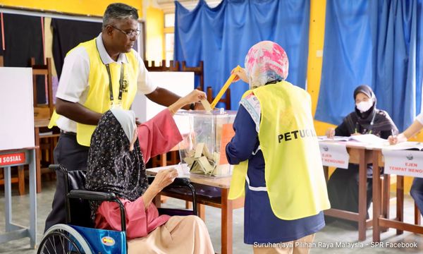 EC workers happy to help voters cast ballots