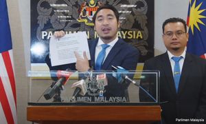 袁怀绍点名法哈斯与“光头拿督”，中介收买在野议员