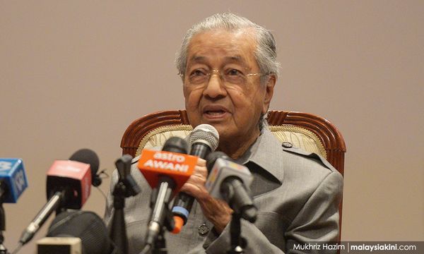 Dr M slams handcuffed editor while high-profile convicts ‘strut freely’