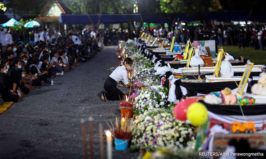 Last goodbyes as Thailand marks lives of child massacre victims