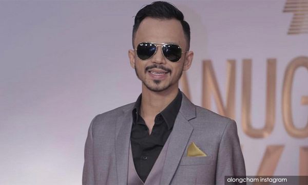 Peniaga didakwa tipu isteri Along Cham lebih RM100,000
