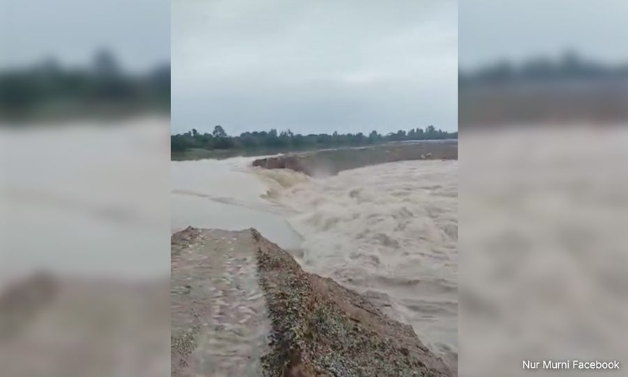 Strong currents break wall on flood mitigation project, causes deluge
