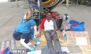 Exhaustion sets in for activist on third day of hunger strike