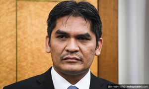Radzi remains as Putrajaya MP, court rules