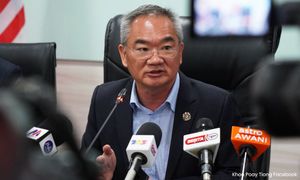 揭国阵两处错误设计，邱培栋提醒希盟谨慎用旗