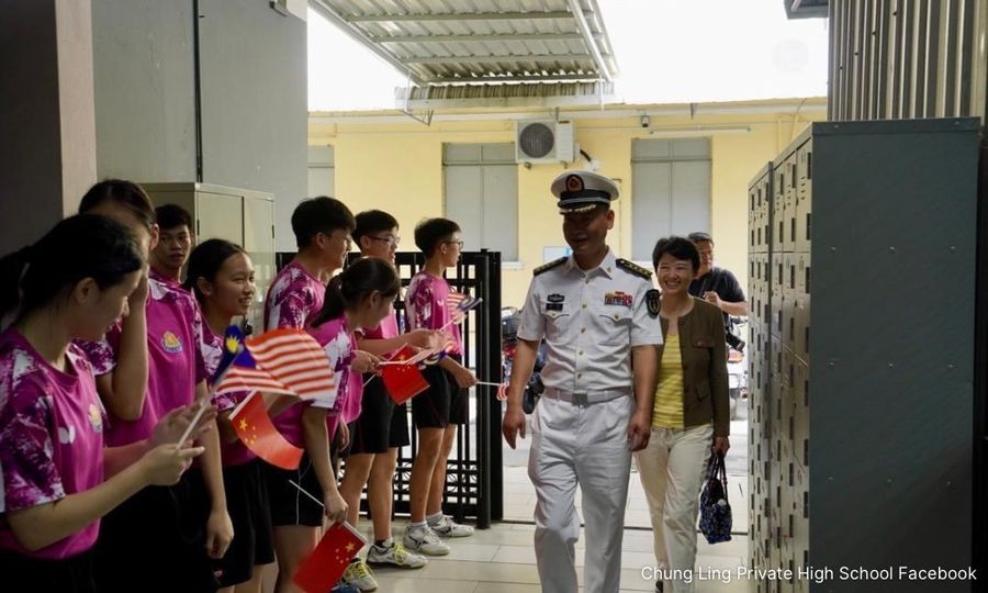 Students holding China flags in Penang school not M'sians: Fahmi