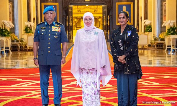 ‘You deserve it', Agong tells security guard after medal award