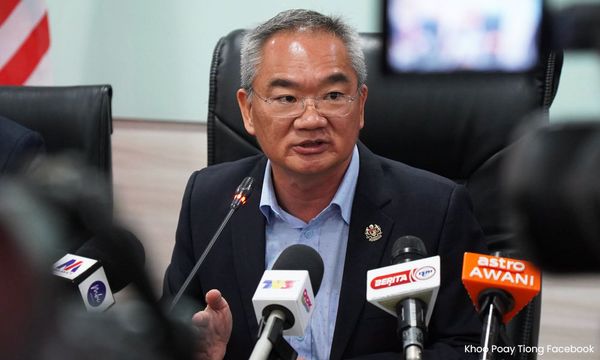 揭国阵两处错误设计，邱培栋提醒希盟谨慎用旗
