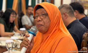 Street worker to volunteer, Mami Vin serves Yogya's HIV/AIDS patients