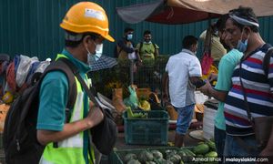 Migrant worker intake not to exceed 15pct of workforce, minister says