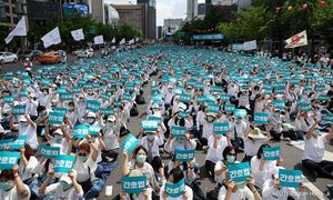 S Korean nurses strike after president vetoes bill on pay, working conditions