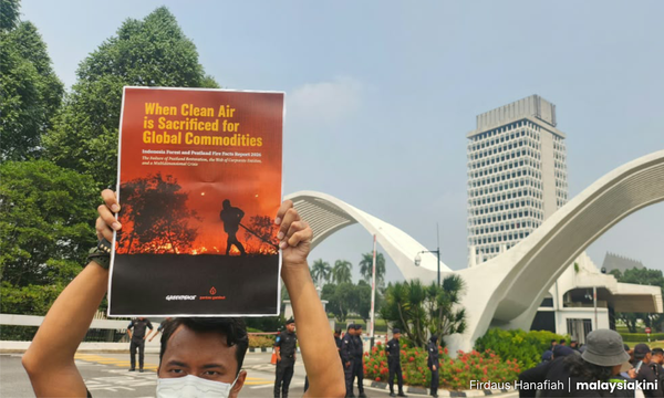 Groups take haze report findings to Parliament, renew push for corporate accountability